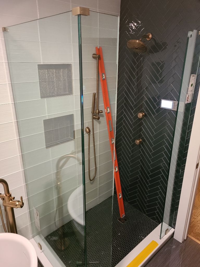 Herringbone tile shower door