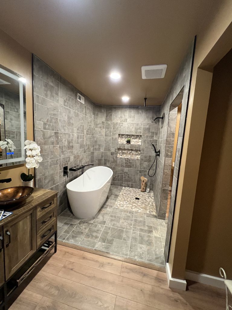 Luxury spa bathroom with frameless glass enclosure